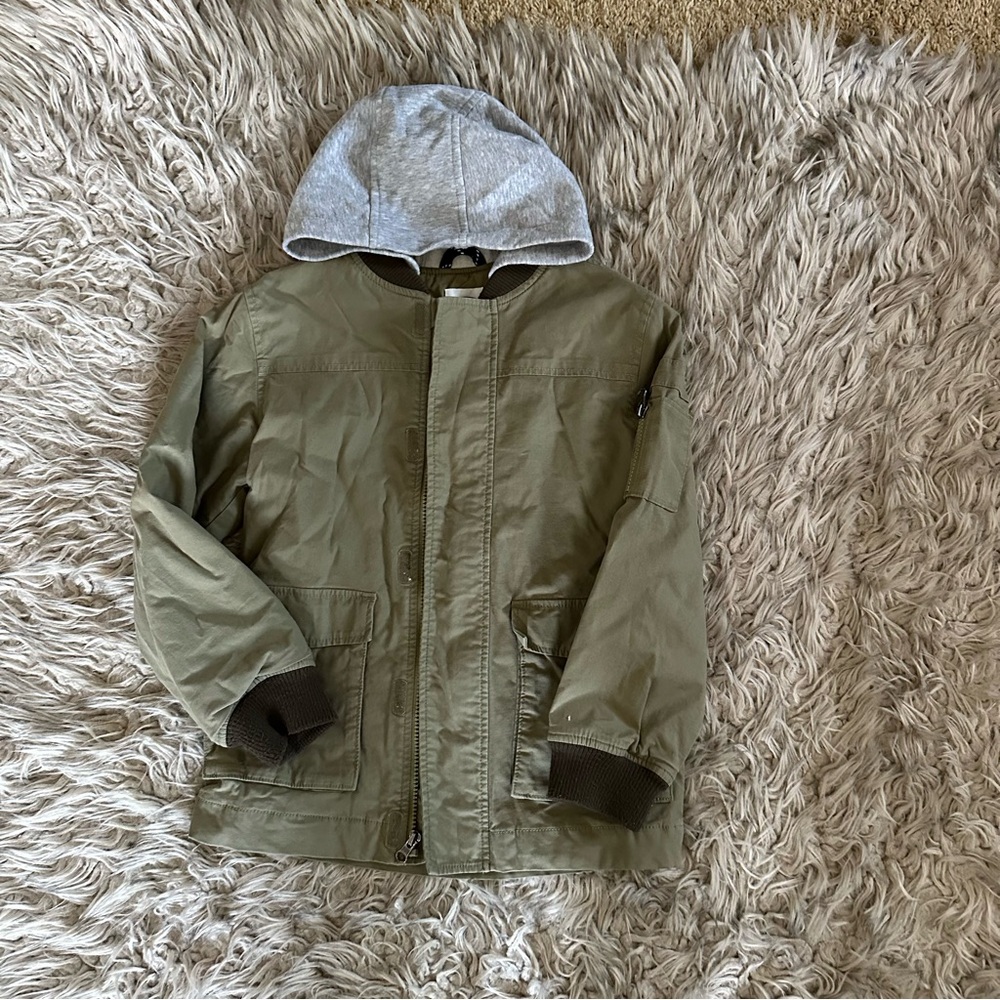 Zip up jacket with hood.